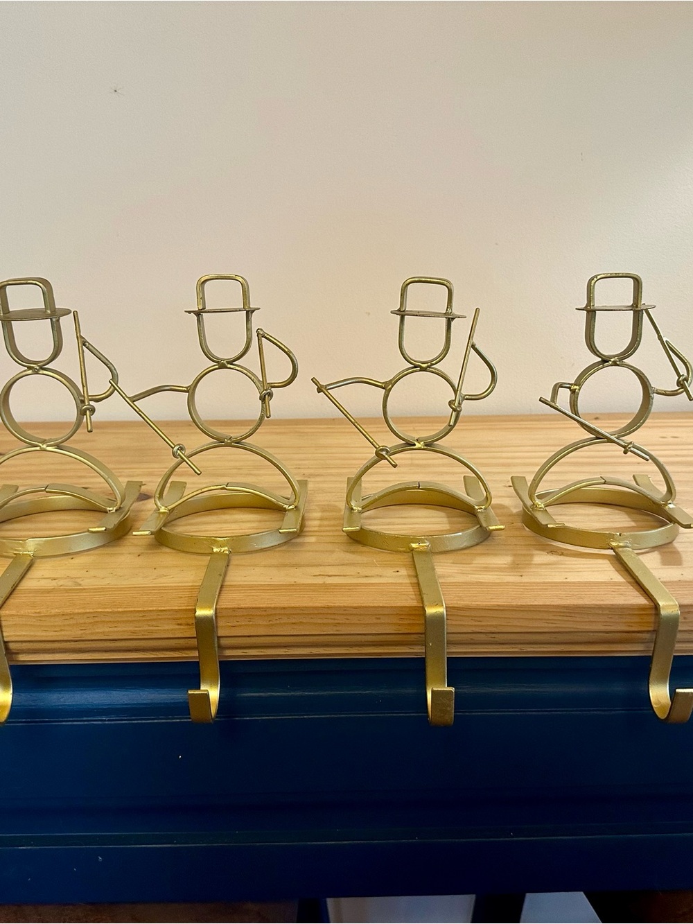 Gold-Toned Skiing Snowman Stocking Holders - Set of 4